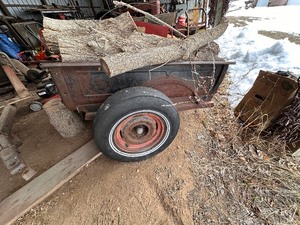 lot 264 image: Vintage trailer and firewood