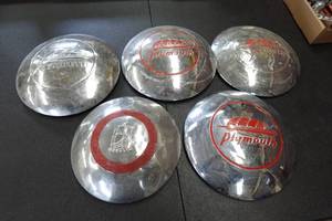 lot 310 image: 1930s Plymouth Hub Caps
