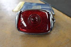 lot 303 image: NOS Tail Light and Bezel for 1940-46 Chevrolet Truck