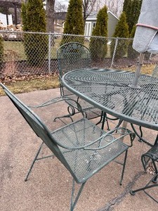 lot 213 image: Vintage Green Metal Patio Table and Four Chairs