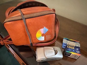 lot 56 image: Olympus 35 MM Camera, Bag and Film