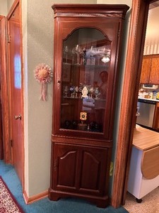 lot 64 image: Corner Curio Cabinet 26 X 76 contents not included