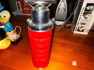 lot 184 image: Vintage Thirst Extinguiser Music Box Plays How Dry I Am  11.5 Tall Mint Condition