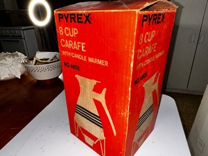 lot 194 image: Vintage Pyrex 8 Cup Carafe with Candle Warmer in Original Box