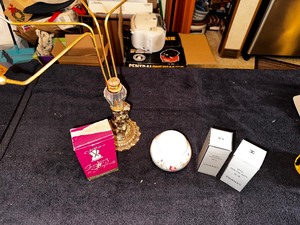 lot 126 image: Vintage Decorative Gold Towel Rack, Vintage New in Packaging Chanel No. 5 Spray Cologne and Bath Oil, Decorative Dish, and Vintage Perfume