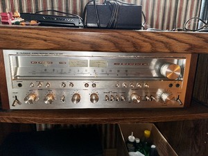 lot 169 image: Vintage Pioneer Stereo Receiver Model SX-1050, Pioneer Cassette Tape Deck Model CT-F9191, Entertainment Center and all Contents In and On