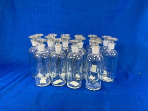 lot 18 image: 16 - 250ml Bottle Narrow Bottom Glass With Class Stopper Narrow Mouth