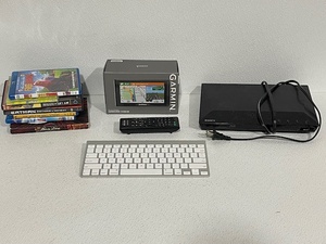 lot 10 image: Garmin, DVDs, Keyboard, and More