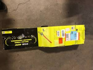 lot 3 image: RYOBI 40V 24 in. Cordless Battery Hedge Trimmer with 2.0 Ah Battery and Charger Customer Returns See Pictures