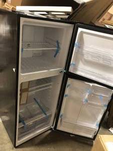 lot 39 image: Magic Chef 10.1 cu. ft. Top Freezer Refrigerator in Platinum Steel Customer Returns See Pictures
