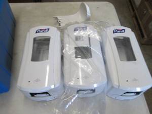 3 Purell Dispensers...