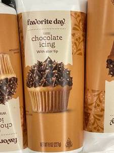 lot 245 image: Chocolate Icing with star tip 13 tubes