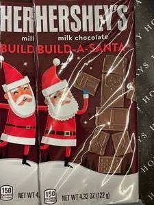 lot 829 image: Hersheys Build a Santa Milk Choc Basrs 7 X 4.32oz. Blue Tape Box Best by 092024