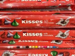 lot 596 image: Milk Choc Kisses 25-30 Best by 052024