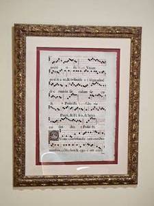 lot 114 image: Framed Illuminated Latin Music Sheet