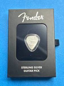 lot 23 image: Fender .925 Silver Guitar Pick (RARE)