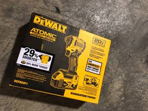 lot 27 image: DEWALT ATOMIC 20V MAX Lithium-Ion Cordless 14 in. Brushless Impact Driver Kit, 5 Ah Battery, Charger, and Bag customer return review pictures