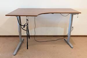 lot 20 image: IKEA L-Shaped Adjustable Height Desk