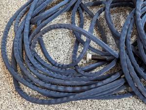 lot 111 image: Three Garden Hoses