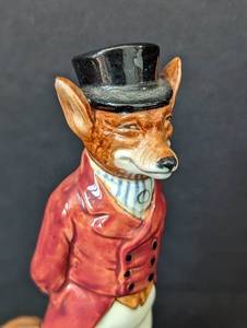 lot 128 image: Royal Doulton Huntsman Fox Figurine