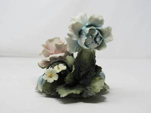 lot 54 image: Italian Floral sculpture  Italy marked 2002 with crown