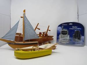 lot 106 image: 4 Hand crafted wooden sailboats and weather monitor (5 pcs)