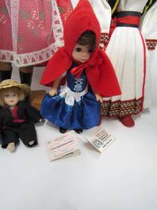 lot 108 image: 12 Pc Lot Fenton milk glass hobnail candle holder, madame Alexander 5 Little Red Riding Hood, Mini McDonalds, candle holders  Krakow