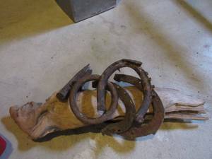 lot 131 image: Little Playmate cooler, horsehoes, vintage scythe