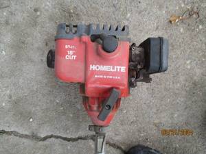 lot 6 image: Homelite Gas String Trimmer 15 Cut