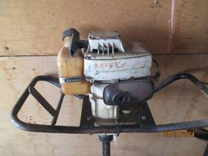 lot 15 image: Gas-Powered Auger with Manual Auger