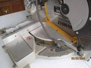 lot 27 image: DeWALT DW716 12-inch Double Bevel Compound Miter Saw