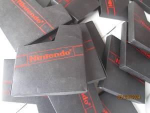 lot 58 image: Lot of Assorted Nintendo Dust Covers for Game Cartridges