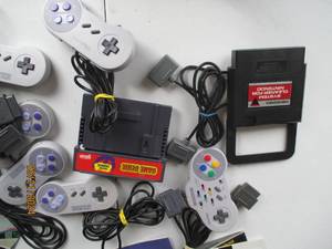 lot 88 image: Vintage Nintendo Gaming Bundle - Console, Controllers, Accessories, and Game Guides