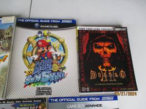 lot 102 image: Assorted Video Game Strategy Guides and Publications Lot