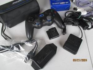 lot 107 image: Assorted Gaming Accessories with Game Boy Advance Case and Battery Charger