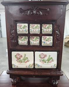 lot 36 image: Vintage Carved Wood and Porcelain Apothecary Spice Cabinet