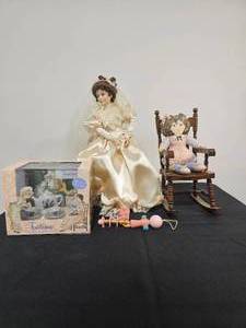 lot 226 image: VTG MOMA Tea Set, Porcelain Doll w Stand, Cloth Doll in Rocking Chair, VTG Baby Toy