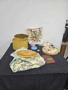 lot 236 image: Misc. Sewing Supplies, Seashell Measuring Tape, Magnetic Pin Holder, Floral Cloth Tote w Bamboo Handles, Scraps of Fabric
