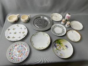 lot 118 image: Family Frolics 1982 St Paul Winter Carnival Plate Norman Rockwell, Nippon Salt & Pepper, Bavaria Blue Floral 7 Plate, Nippon Gold Yellow Flowers 8 Plate, Austria L S & S Carlsbad 9 Floral Plate, Floral 7.5 Plate Germany, Nippon Daisy 7.5 Plate