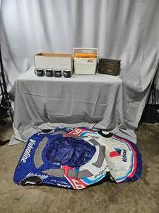 lot 168 image: Lot of Outdoor Gear Inc Ardbeg Mugs, Coleman Cooler, 30 CAL Ammunition Box & Inflatable Raft