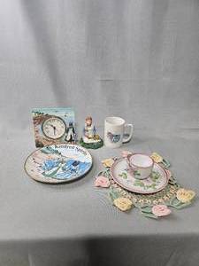lot 215 image: Kindred Spirits Clock, Figurine, Plate & Cup, Floral Doily, Tea Cup & Saucer