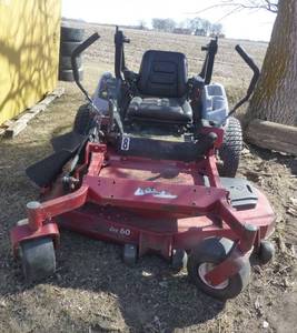 ExMark 60 inch riding mower with 2956 hours, motor was replaced with a Kawasaki FX801V