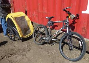 Trek bike with lock, needs new chain, comes with covered child hauler