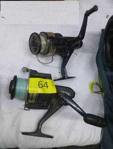 Two spinning fishing reels, Daiwa and Abu Garcia