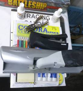 3 hole punch, stapler, white out, tracing paper, coloring book