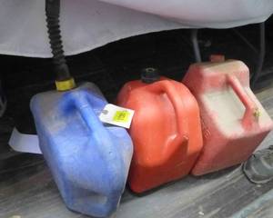 Three 5 gallon gas cans