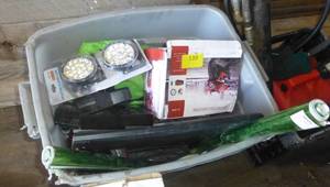 Tote of misc, new motorcycle amp, lights, hitch, Redskins picture, wrapping paper