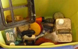 tote full of car repair and cleaning items