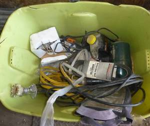 tote and pails of misc parts and bolts