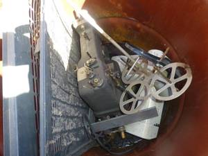 55 gal barrell with a couple of sewing machines for parts